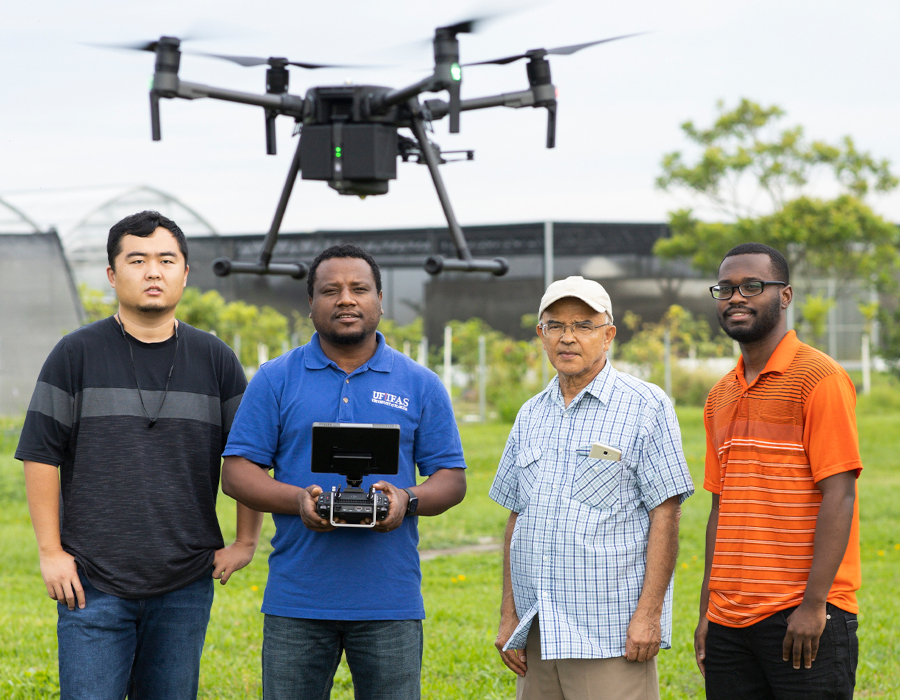 Dr. Bayabil flying a drone at UF/IFAS